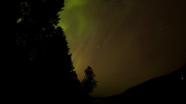 aurora borealis in mountain landscape