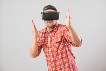 Man in fighter stand with virtual reality glasses