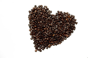 Roasted coffee bean as heart shape on white background