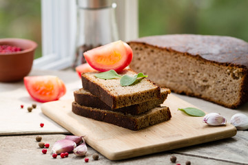 Rye bread. Slices of rye bread on the kitchen table