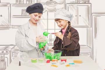 Children making christmas cupcakes
