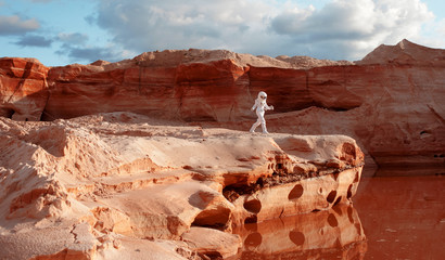futuristic astronaut on another planet, image with the effect of toning
