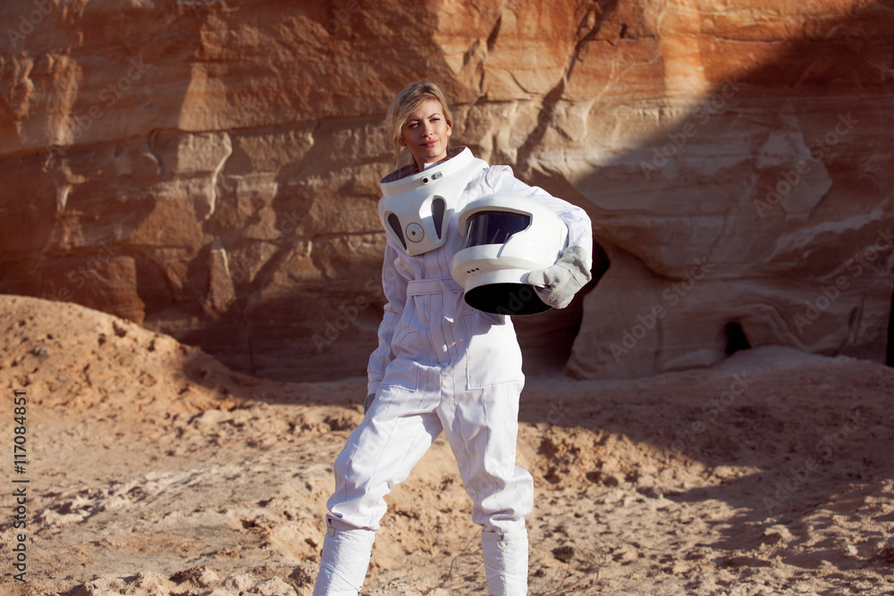 Poster futuristic astronaut without a helmet on another planet, image with the effect of toning