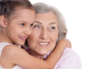 Grandmother with her cute  granddaughter 