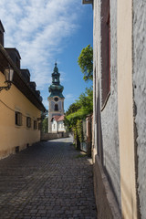 Street with a church, Banska Stiavnica, Slovakia