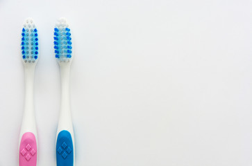 a couple of toothbrush isolated on white, copy space