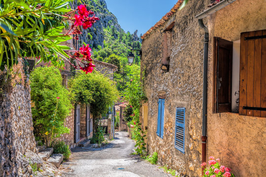 Fototapeta Moustiers Sainte Marie village with street in Provence, France
