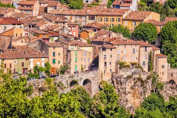 Fototapeta na wymiar Moustiers Sainte Marie village on rocks in Provence, France