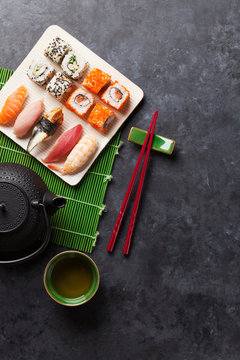 Set of sushi, maki and green tea
