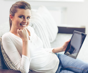 Fototapeta premium Attractive young woman with gadget