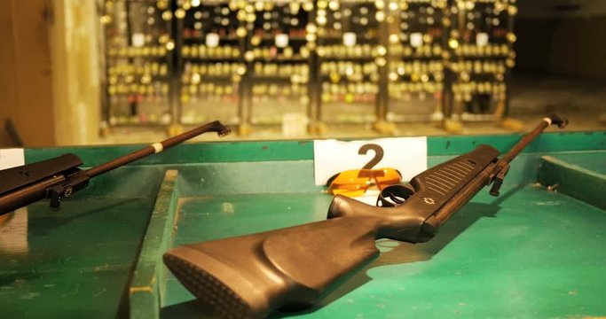 shooting cans and toys in shooting range