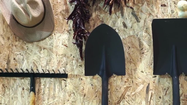 Gardening and farm tools. Agricultural equipments concept, hat, rake, spade and shovel