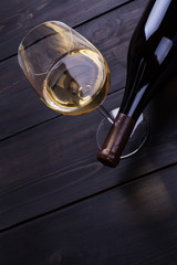 White wine on dark wood