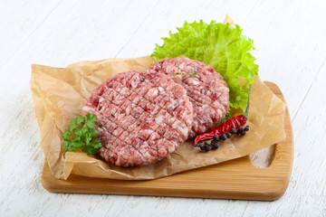 Raw burger cutlet