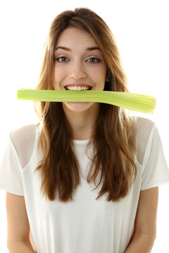 Beautiful Girl Eating Celery, Isolated On White