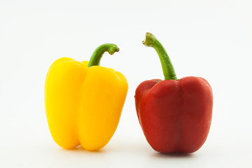 Yellow and red pepper on white background.Healthy concept.