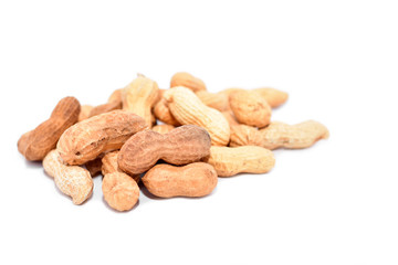 Roasted peanuts isolated on white