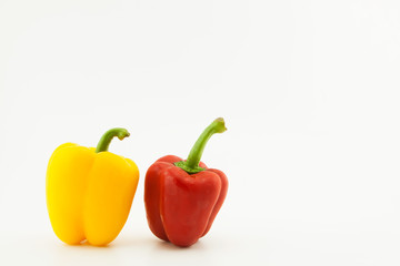 Yellow and red pepper on white background.Healthy concept.