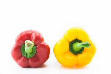 Yellow and red pepper on white background.Healthy concept.