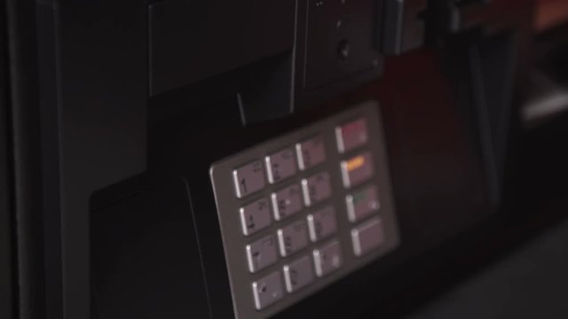Detail footage of ATM receipt printout

