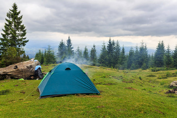 Camping tent at Carpathian mountains, summertime journey, Ukraine, Europe.