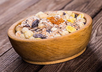 rolled oats in bowl and muesli ingredients