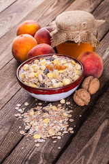 rolled oats in bowl and muesli ingredients