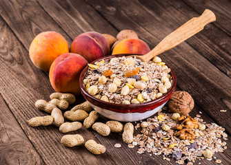 rolled oats in bowl and muesli ingredients