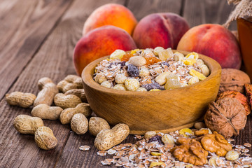 rolled oats in bowl and muesli ingredients