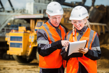 Two people working