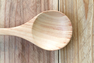 wooden spoon on wood floor.
