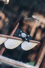 Close up of a wooden pirate ship toy