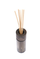 Aroma sticks in a glass vial isolated