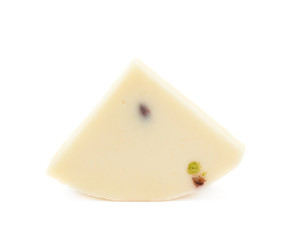 Slice fragment of white cheese isolated