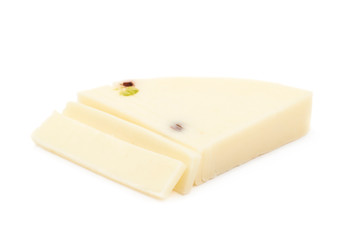 Slice fragment of white cheese isolated