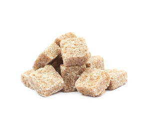 Pile of brown sugar cubes isolated