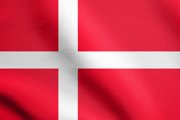 Fototapeta premium Flag of Denmark waving in wind with fabric texture