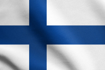 Flag of Finland waving in wind with fabric texture