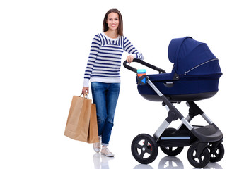 Full length portrait of a mother with a stroller, isolated on white background