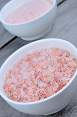 Fototapeta na wymiar Bowls with pink salt