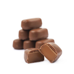 Chocolate coated toffee candy isolated