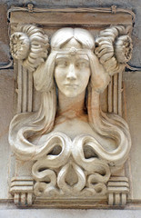 Art Nouveau Female bust stone carving on outside of building, Barcelona, Spain. Example of German Art Nouveau jugendstil artistic style.
