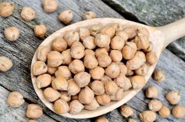 Wooden spoon with chick peas