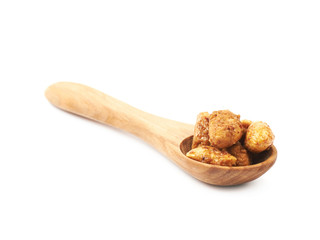 Spoon full of peanuts isolated
