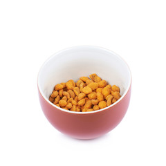 Bowl filled with peanuts isolated