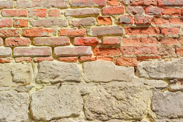 Background of old stone and brick fortress wall