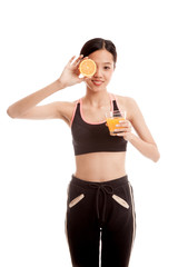 Beautiful Asian healthy girl with orange juice and orange fruit