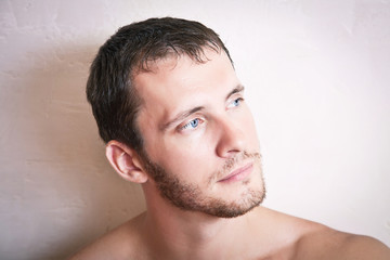 Obraz premium Portrait of thoughtful attractive man close up