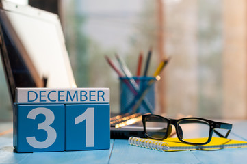 December 31st. Day 31 of month, calendar on workplace background. New year at work concept. Winter...