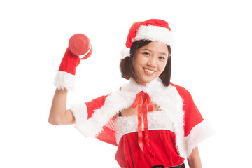 Asian Christmas girl with Santa Claus clothes and red dumbbell